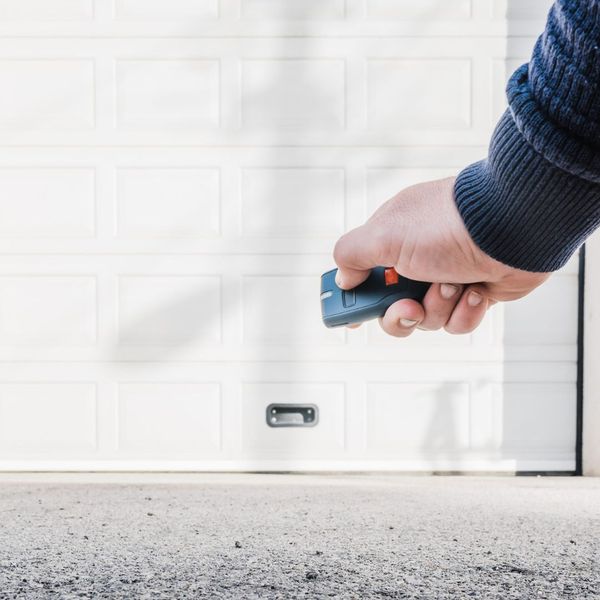 person using garage door opener