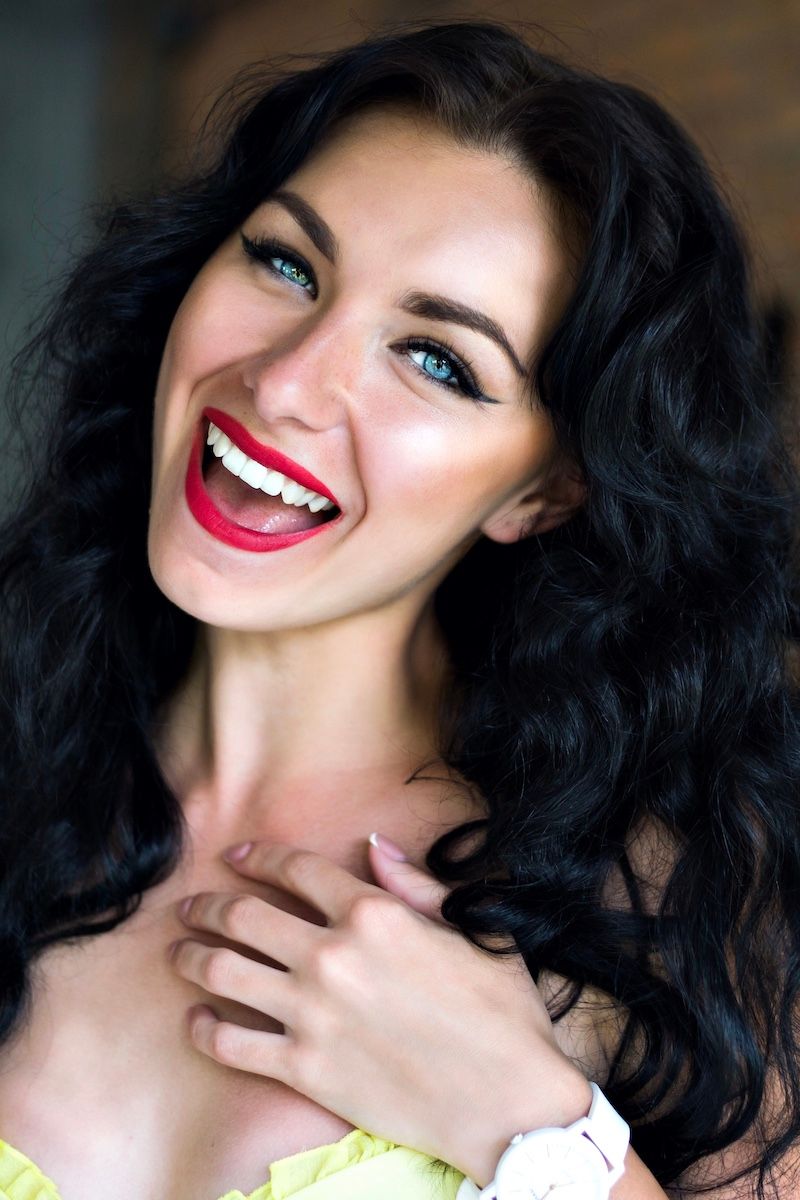 A smiling woman with beautiful hair
