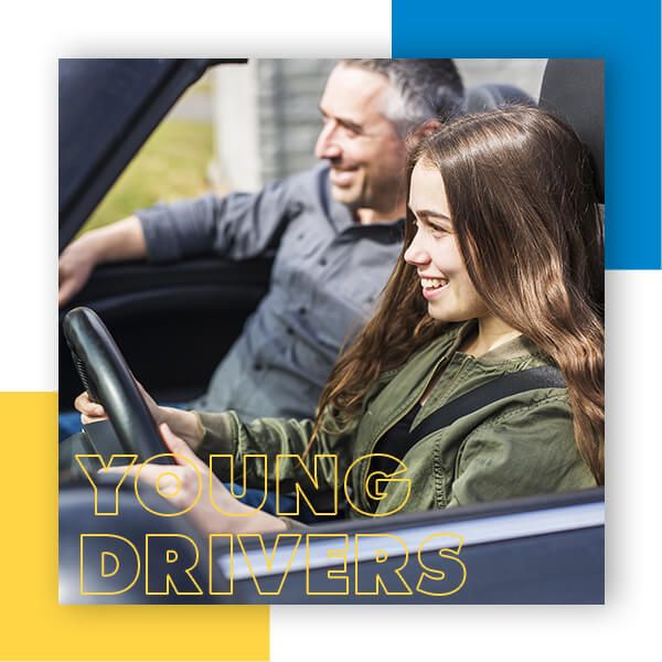Teen girl learning how to drive with her dad