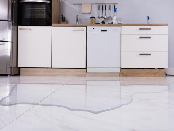 flooded kitchen caused by dishwasher