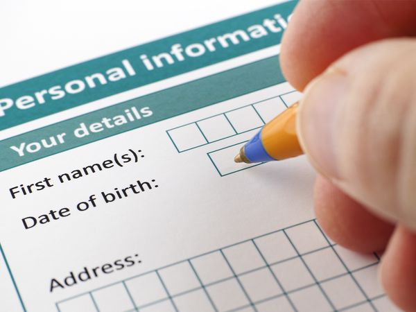 person filling out their personal information form
