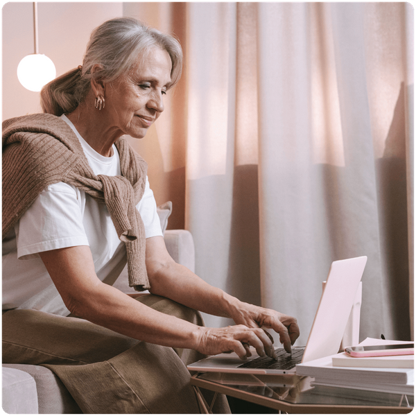 senior woman using her laptop computer