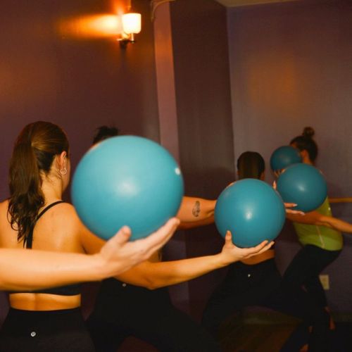 Barre Fitness class with medicine balls Barre Fitness class with medicine balls