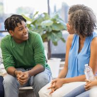 young teen and mother talking