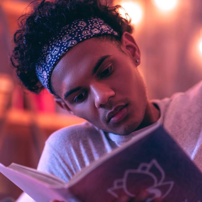 teen boy reading