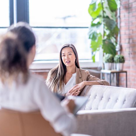 Woman talking with therapist
