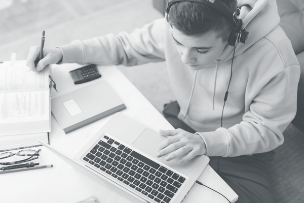 teen student studying, writing, books, laptop