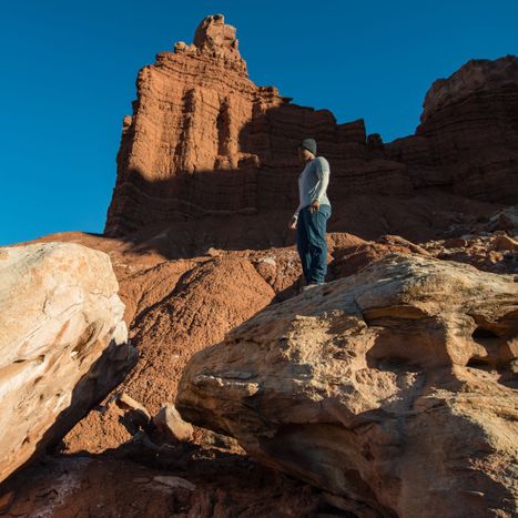 Person standing on rock formations