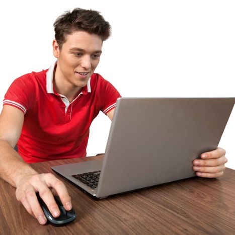 Teen looking at computer 