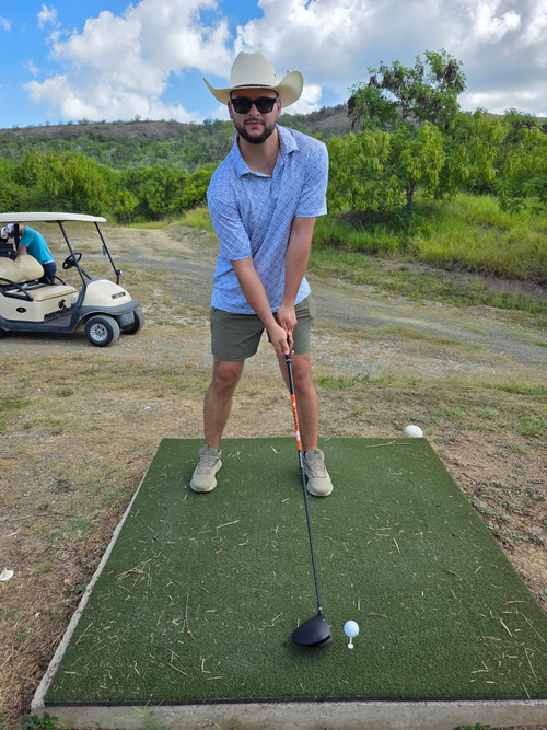 Warrior Golf Academy, Jordan Oaks Country Music Artist teeing Off From Mat at Naval Station Guantanamo Bay GTMO Military Morale Event
