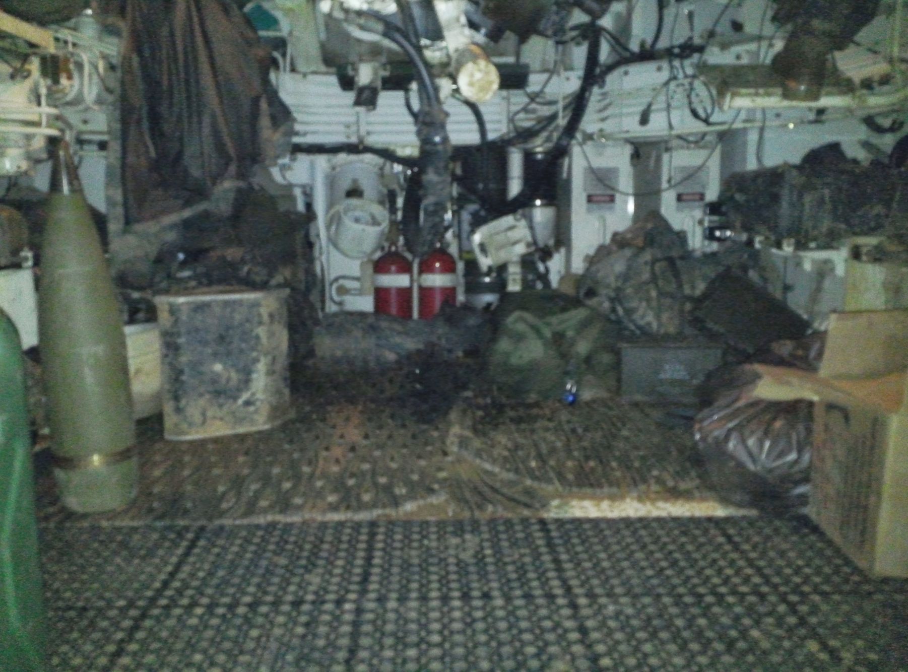 Interior perspective of a military vehicle during an active mission. This photo highlights the authentic Military background of the WGA team, bridging the gap between tactical service and the healing power of golf for Veterans and First Responders. WGA Veteran Founder Service Photo