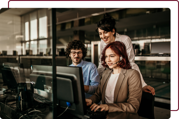 employees looking at computer