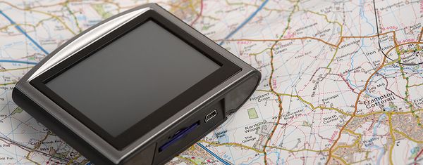 Image of a GPS device and a map