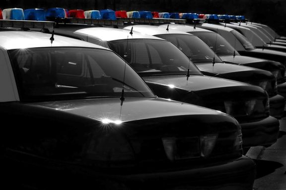 image of a fleet of police cars
