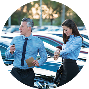 image of two people in a parking lot