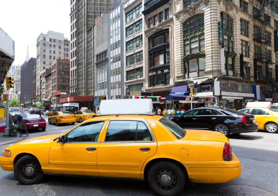 image of taxi cabs in a city