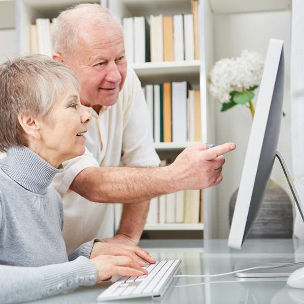 elderly looking at computer