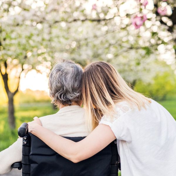 mom hugging daughter