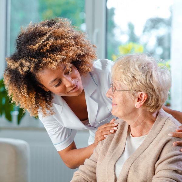 caregiver with senior woman