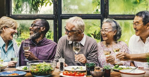 senior friends enjoying lunch