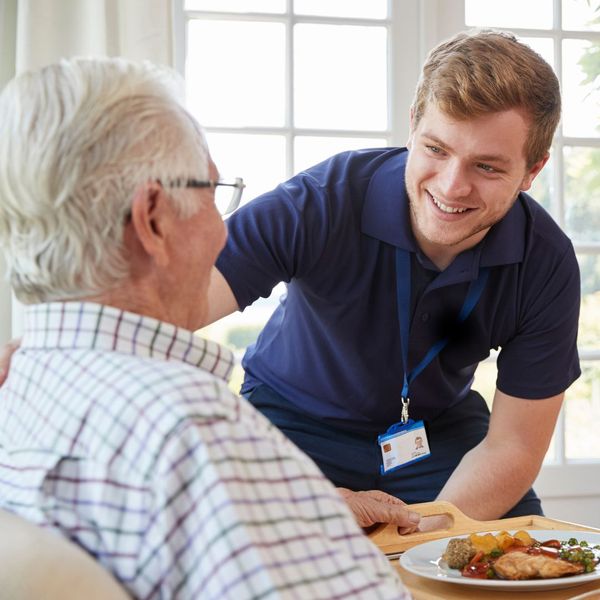 caregiver with elderly man