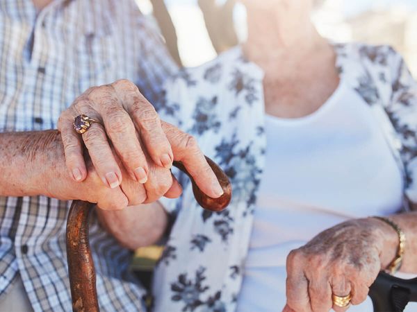 detail photo of senior couple's hands