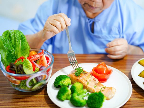 senior eating a healthy meal