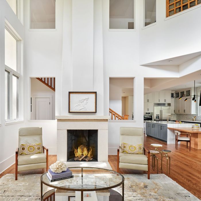 open concept living room with vaulted ceilings