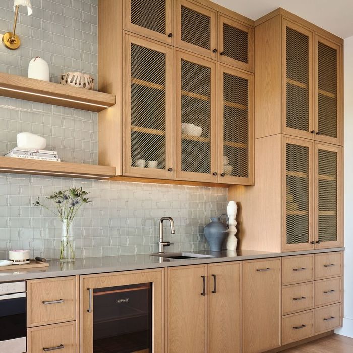 tall light oak cabinetry