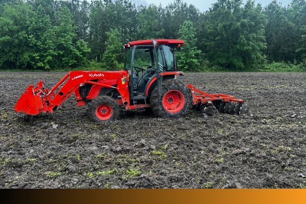 tractor clearing land 