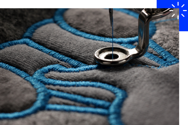 sweatshirt being embroidered sweatshirt being embroidered