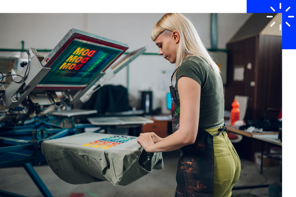 Woman printing a shirt
