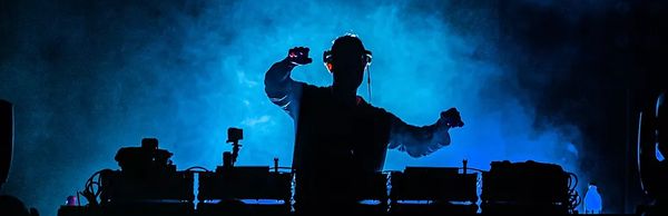 Image of a DJ playing music