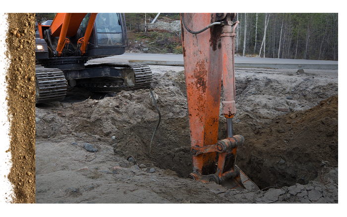 excavator digging large hole