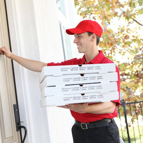 man delivering pizzas