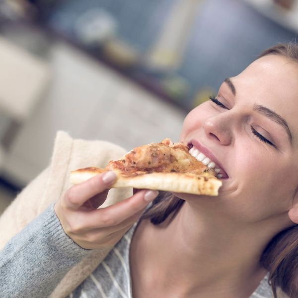 Woman Eating Pizza 