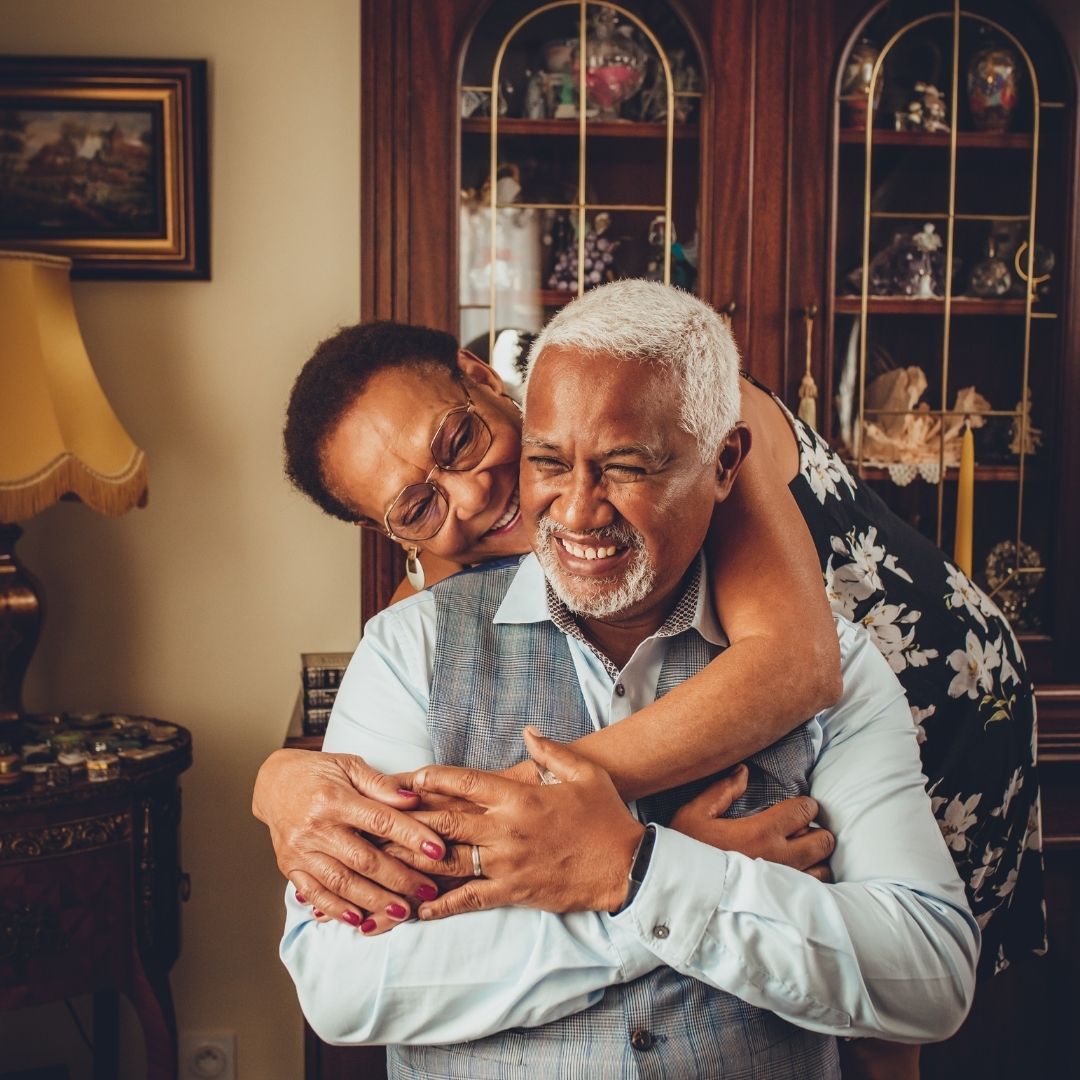 Couple hugging and laughing 