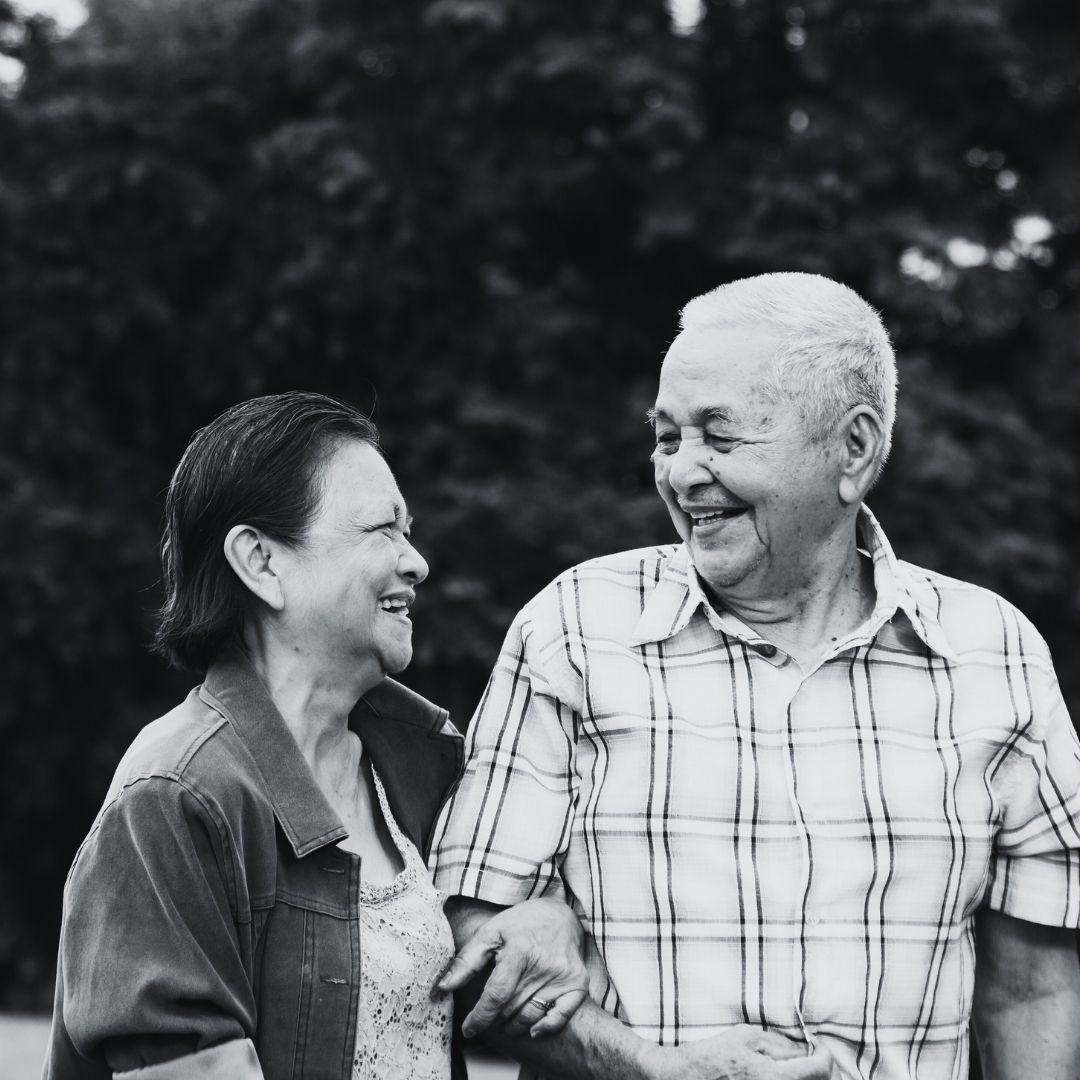 Happy couple smiling at each other 