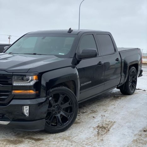 Black truck in parking lot