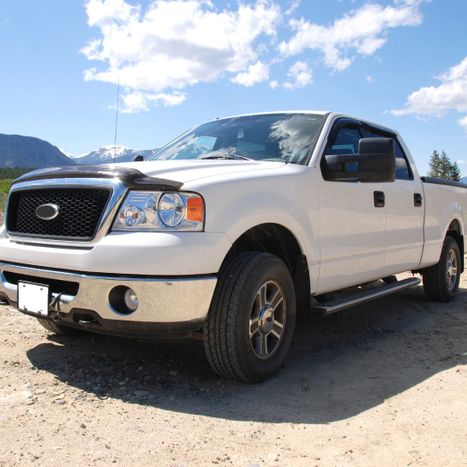 white truck under a blue sky