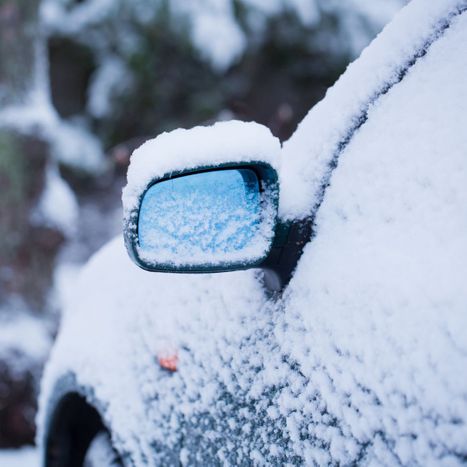 a snow covered car