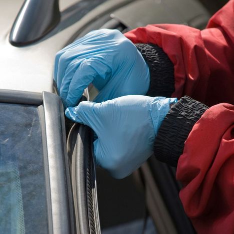 windshield repair with molding being taken off