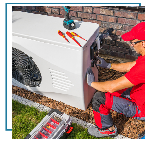 HVAC contractor testing heat pump