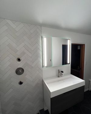 renovated bathroom with tiling work and shower 453746740_960273136112054_8132139469095145520_n.jpg