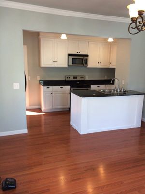 renovated kitchen with white cabinets and granite countertops 491573099_3853798228264738_2298753026465271643_n.jpg