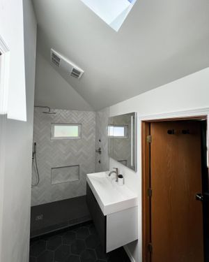 renovated bathroom with tiling work and shower 453724624_960273142778720_1117340490522266431_n.jpg
