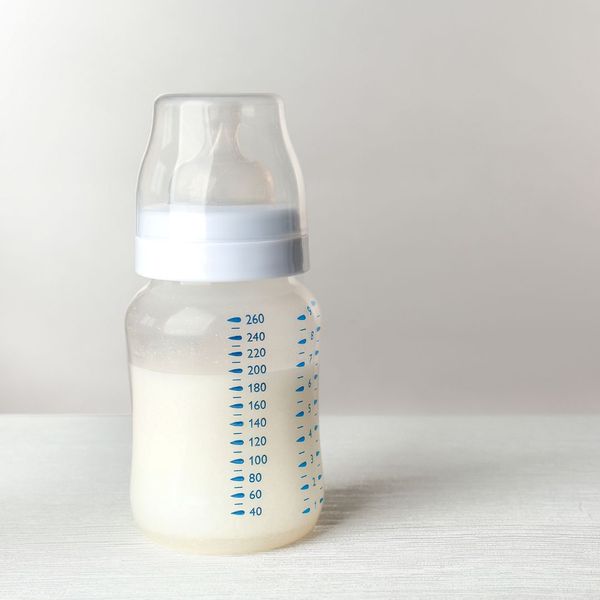 baby bottle with measurements, emphasizing milk intake tracking baby bottle with measurements, emphasizing milk intake tracking