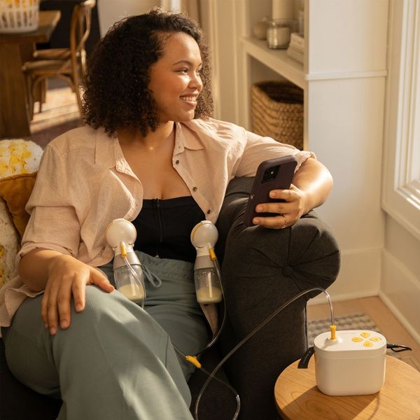 Mother efficiently using an electronic breast pump Mother efficiently using an electronic breast pump
