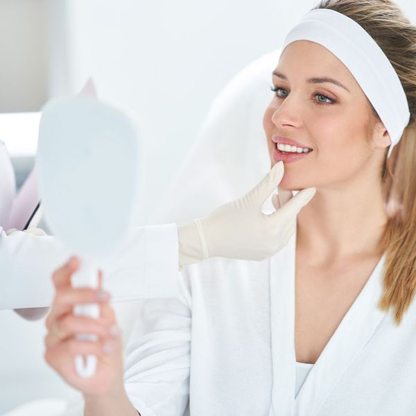 woman observing results from injections