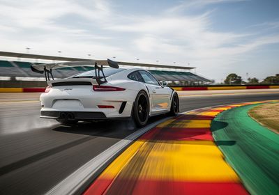 White Porsche GT3 RS on Racetrack